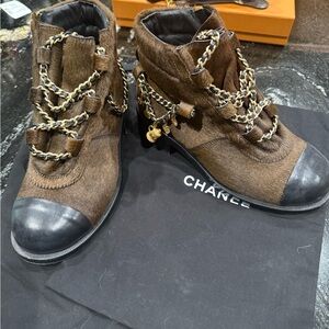 Authentic CHANEL ponyhair booties with charms. Size 37. Good condition.